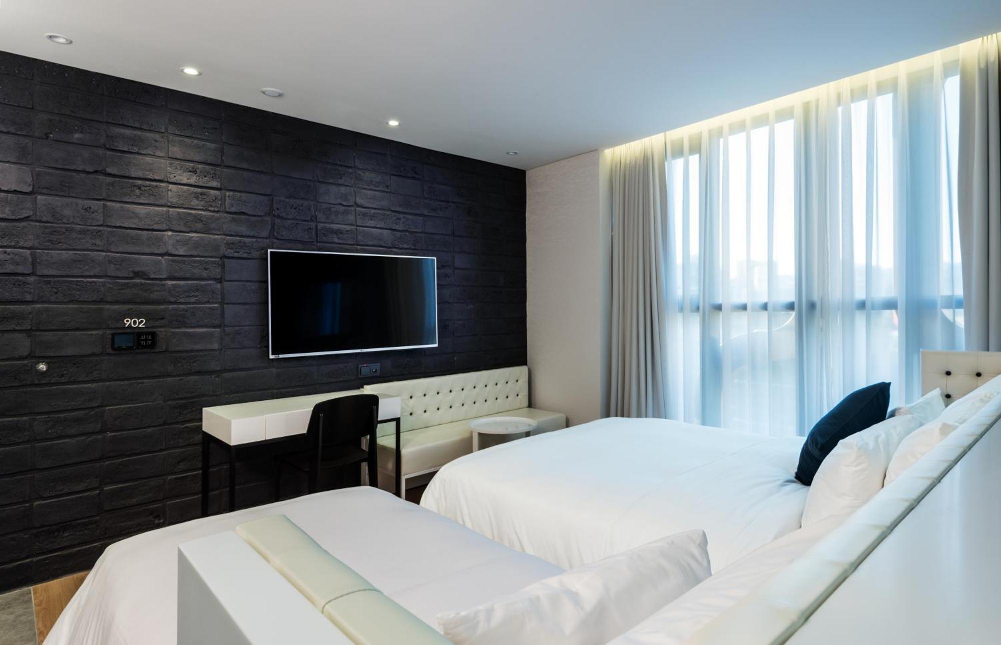 Deluxe Familiekamer met 2 Aparte Bedden